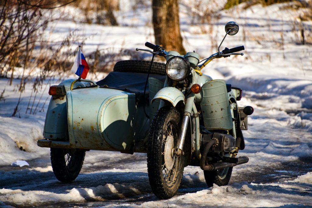 a motorcycle parked in the snow